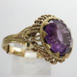 9ct gold ring set with a large purple topaz, size O, 4.7g. UK P&P Group 1 (£16+VAT for the first lot