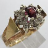 9ct gold cluster ring set with ruby and diamonds, size O/P, 4.0g. UK P&P Group 1 (£16+VAT for the