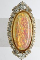 Yellow metal brooch set with large opal and cubic zirconia, L: 40 mm. UK P&P Group 1 (£16+VAT for