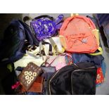 Large quantity of handbags and rucksacks. Not available for in-house P&P