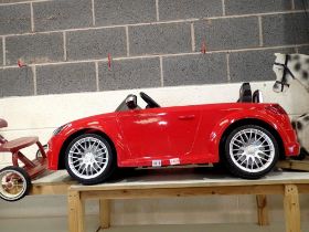 Childs red ride on Audi TT, working at lotting. Not available for in-house P&P