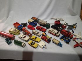 Approximately twenty five diecast vehicles, mostly Dinky Toys trucks, cars, aircraft, mostly for