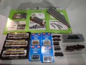 Two N gauge locomotives, three coaches and nine wagons, mostly in very good to excellent