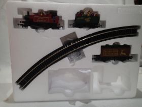 OO scale Hornby Santa express part set 0.4.0 loco, red , 012, plus two wagons, and track only,