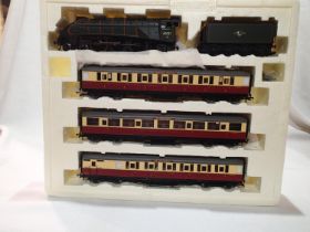 OO scale Hornby R2435 The Northumbrian train pack, A4 class locomotive with three Blood/Custard