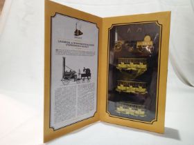 OO scale Hornby R3810 Liverpool and Manchester Rocket train pack, Rocket with three coaches, in near