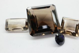 Four smokey quartz stones, largest 15 x 15 x 15 mm. UK P&P Group 1 (£16+VAT for the first lot and £