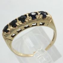 9ct gold ring set with sapphires, size L/M, 2.0g. UK P&P Group 0 (£6+VAT for the first lot and £1+