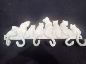 Cast iron cat tail coat hook, W: 25 cm. UK P&P Group 1 (£16+VAT for the first lot and £2+VAT for