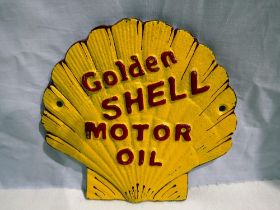 Cast iron Golden Shell plaque. W:15cm UK P&P Group 1 (£16+VAT for the first lot and £2+VAT for