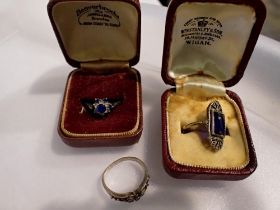Three rings, one 9ct gold a 9ct gold and silver ring set with sapphires and a 925 silver ring, mixed