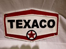 Cast iron hexagonal Texaco plaque. W: 20cm. UK P&P Group 1 (£16+VAT for the first lot and £2+VAT for