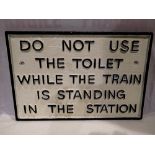 Cast iron 'Do not use the toilet' sign, W: 27 cm. UK P&P Group 1 (£16+VAT for the first lot and £2+