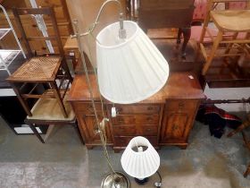 Ceramic oriental lamp and a brass standard lamp. All electrical items in this lot have been PAT