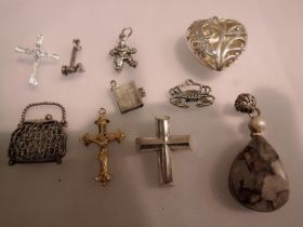 Ten pendants including a hallmarked silver example. UK P&P Group 1 (£16+VAT for the first lot and £