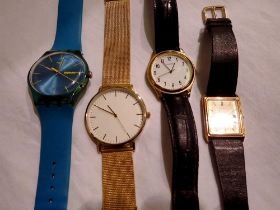 Four wristwatches including Accurist, Seconda and a Swatch watch. UK P&P Group 1 (£16+VAT for the