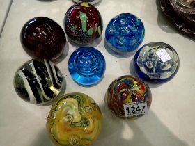 Eight glass paper weights. Not available for in-house P&P