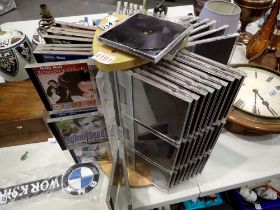 Rotating CD rack with DVDs. Not available for in-house P&P