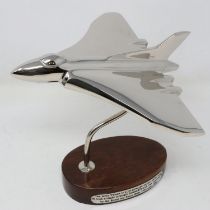 Chrome Vulcan bomber on wooden base, H: 18 cm. UK P&P Group 2 (£20+VAT for the first lot and £4+