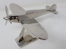 Chrome spitfire on stand, H: 17 cm. UK P&P Group 2 (£20+VAT for the first lot and £4+VAT for