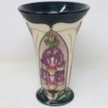 Moorcroft vase in the Fox Glove pattern, crazing throughout but no cracks or chips, H: 17 cm. UK P&P