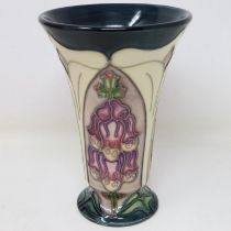 Moorcroft vase in the Fox Glove pattern, crazing throughout but no cracks or chips, H: 17 cm. UK P&P