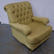 A large 20th century button-back fireside armchair. Not available for in-house P&P