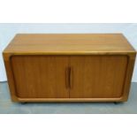 Dyrland mid 20th century teak media cabinet, having a fitted interior and tambour rolling doors, 125