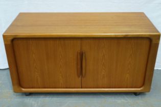 Dyrland mid 20th century teak media cabinet, having a fitted interior and tambour rolling doors, 125