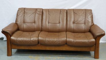 Stressless: A modern brown leather three seat sofa. Not available for in-house P&P