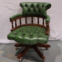 A 20th century green leather Chesterfield style desk chair. Not available for in-house P&P