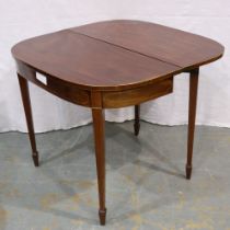 A 19th century fold over table, inlaid and raised on tapering supports. Not available for in-house