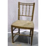 A 19th century Chinoiserie chair, with painted frame, rush seat and bamboo from stretchers, rush