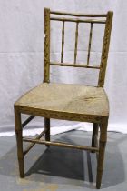 A 19th century Chinoiserie chair, with painted frame, rush seat and bamboo from stretchers, rush
