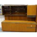 McIntosh teak sideboard with floating display cabinet above, 180 x 52 x 140 cm H. Not available