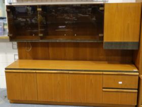 McIntosh teak sideboard with floating display cabinet above, 180 x 52 x 140 cm H. Not available