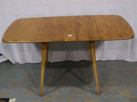 Ercol: an elm drop leaf dining table in the Goldsmith design, 137 x 75 x 71 cm H. Not available