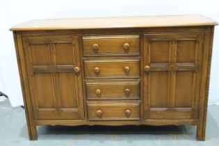 Ercol old colonial sideboard of drawers and cupboards, 145 x 52 x 90 cm H. Not available for in-