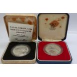 The Royal Mint: two silver proof crowns, Falkland Island Mount Pleasant Airport with certificate and