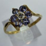 9ct gold cluster ring set with diamond and aquamarine, size M/N, 1.4g. UK P&P Group 1 (£16+VAT for