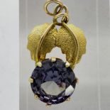 Unmarked 14ct gold and round cut amethyst leaf shaped pendant, H: 20 mm, 1.3g. UK P&P Group 1 (£16+