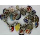 Sterling silver charm bracelet with eighteen enamelled charms, L: 20 cm. P&P Group 1 (£14+VAT for