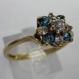 9ct gold cluster ring set with blue topaz and cubic zirconia, size P/Q, 1.9g. UK P&P Group 1 (£16+