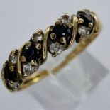 9ct gold ring set with sapphires and cubic zirconia, size Q/R, 2.0g. UK P&P Group 1 (£16+VAT for the