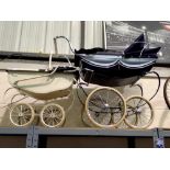 Silver Cross dolls pram with cover and a Triang dolls pram. Not available for in-house P&P