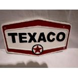 Cast iron hexagonal Texaco plaque. W: 20cm. UK P&P Group 1 (£16+VAT for the first lot and £2+VAT for