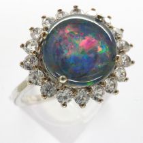 925 silver cluster ring set with cubic zirconia and a large Australian opal, size R/S, 3.7g. UK P&
