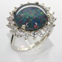 925 silver cluster ring set with cubic zirconia and a large Australian opal, size M, 3.5g. UK P&P