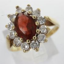 9ct gold cluster ring set with garnet and cubic zirconia, size L/M, 2.1g. UK P&P Group 0 (£6+VAT for
