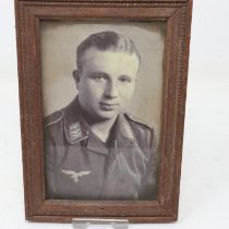 WWII framed photograph of a Luftwaffe pilot. UK P&P Group 2 (£20+VAT for the first lot and £4+VAT